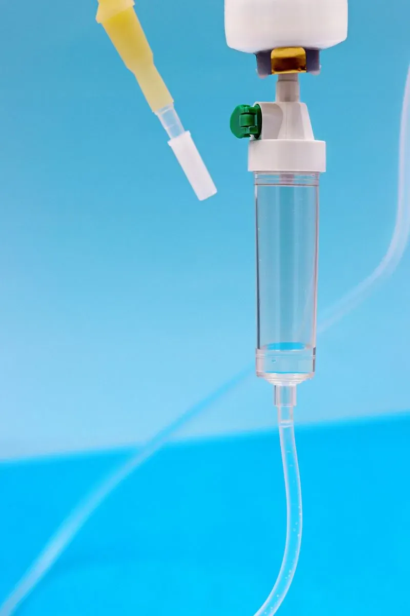 IV stem cell therapy — an IV drip prepared in a bright clinical setting