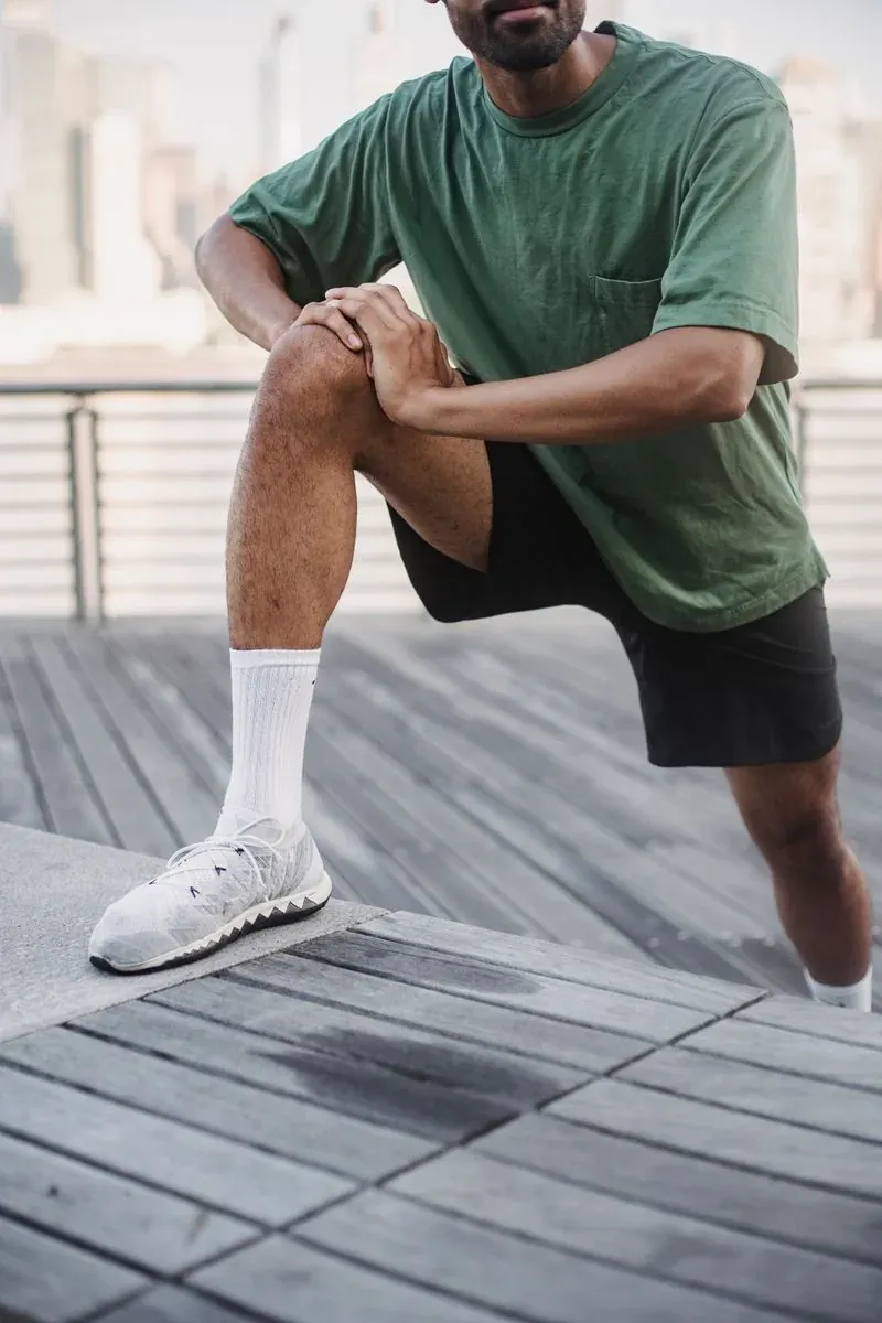 PRP joint treatment — active man stretching comfortably outdoors